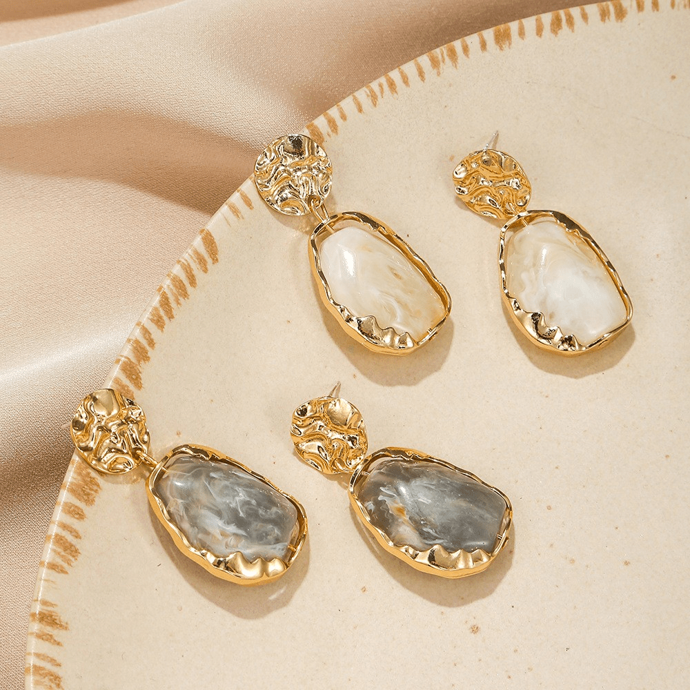 A pair of resin geometry earrings Fashion earrings Vintage irregular pendants temperament studs